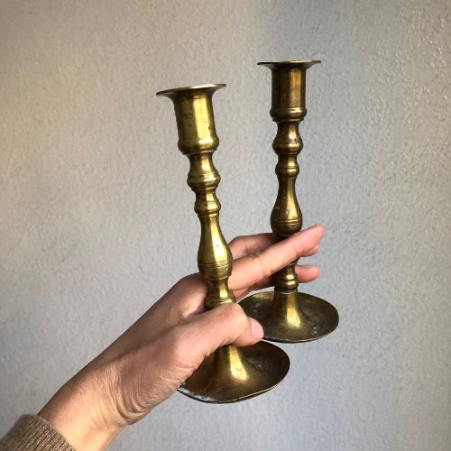 vintage round-shaped brass candlestick